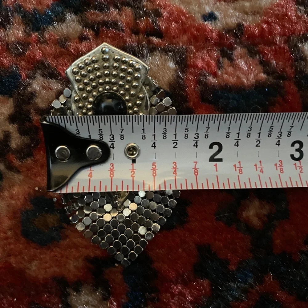 Vintage silver and onyx brooch